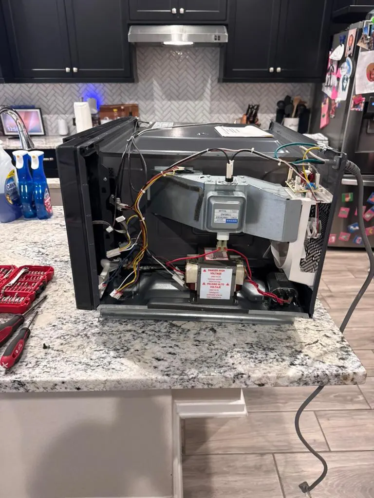 Quality Repairs microwave repair service example