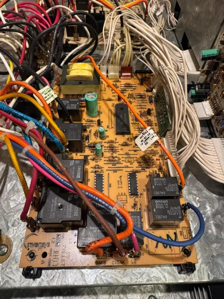 Oven control heat damage documented during appliance diagnosis